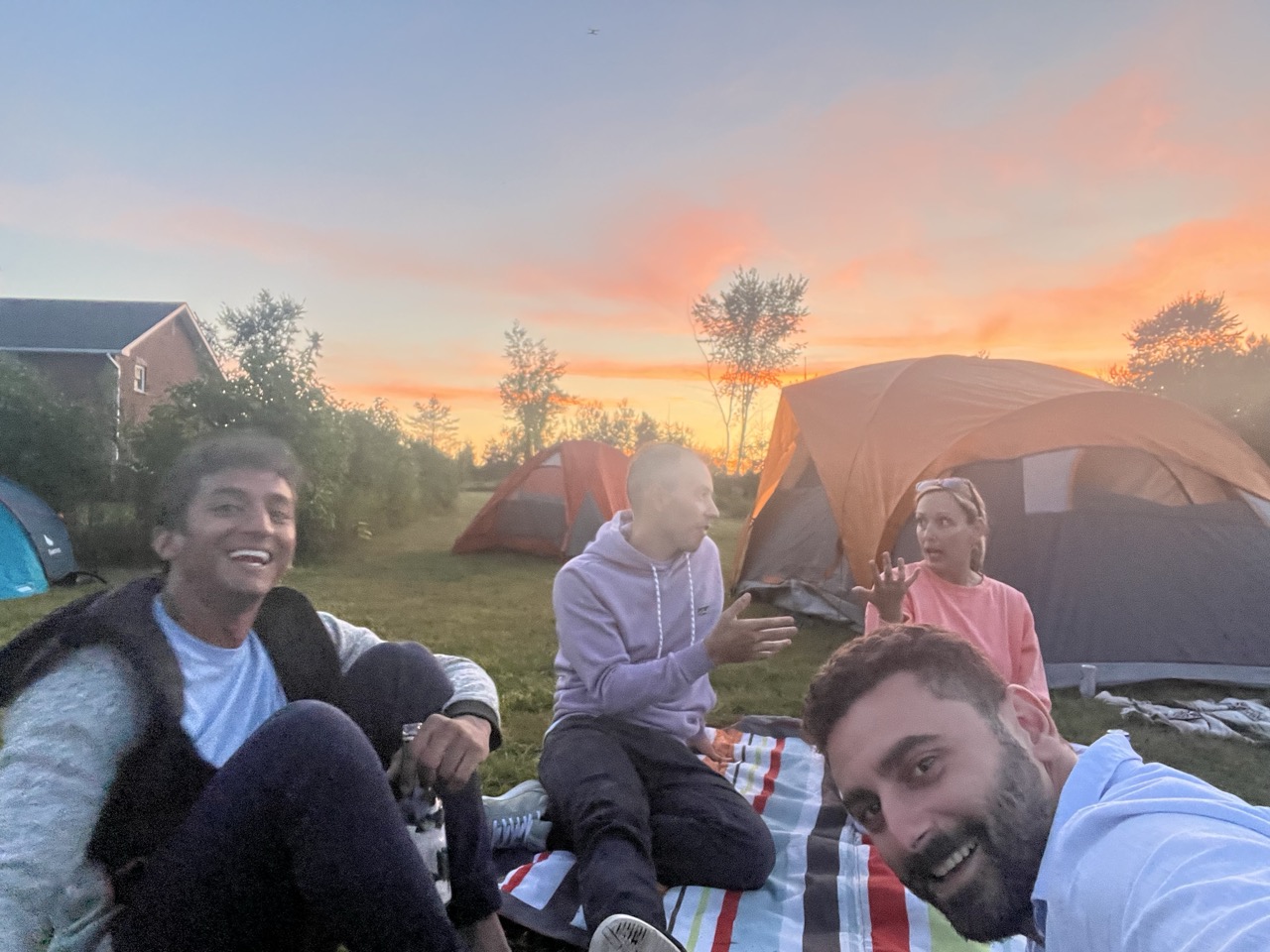 Friends gathered at sunset
